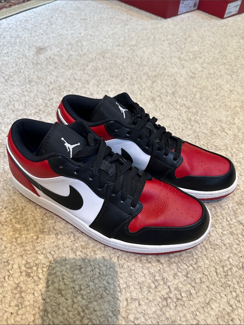 Air Jordan Low Top Sneakers in Black, Red, White. Classic Jumpman